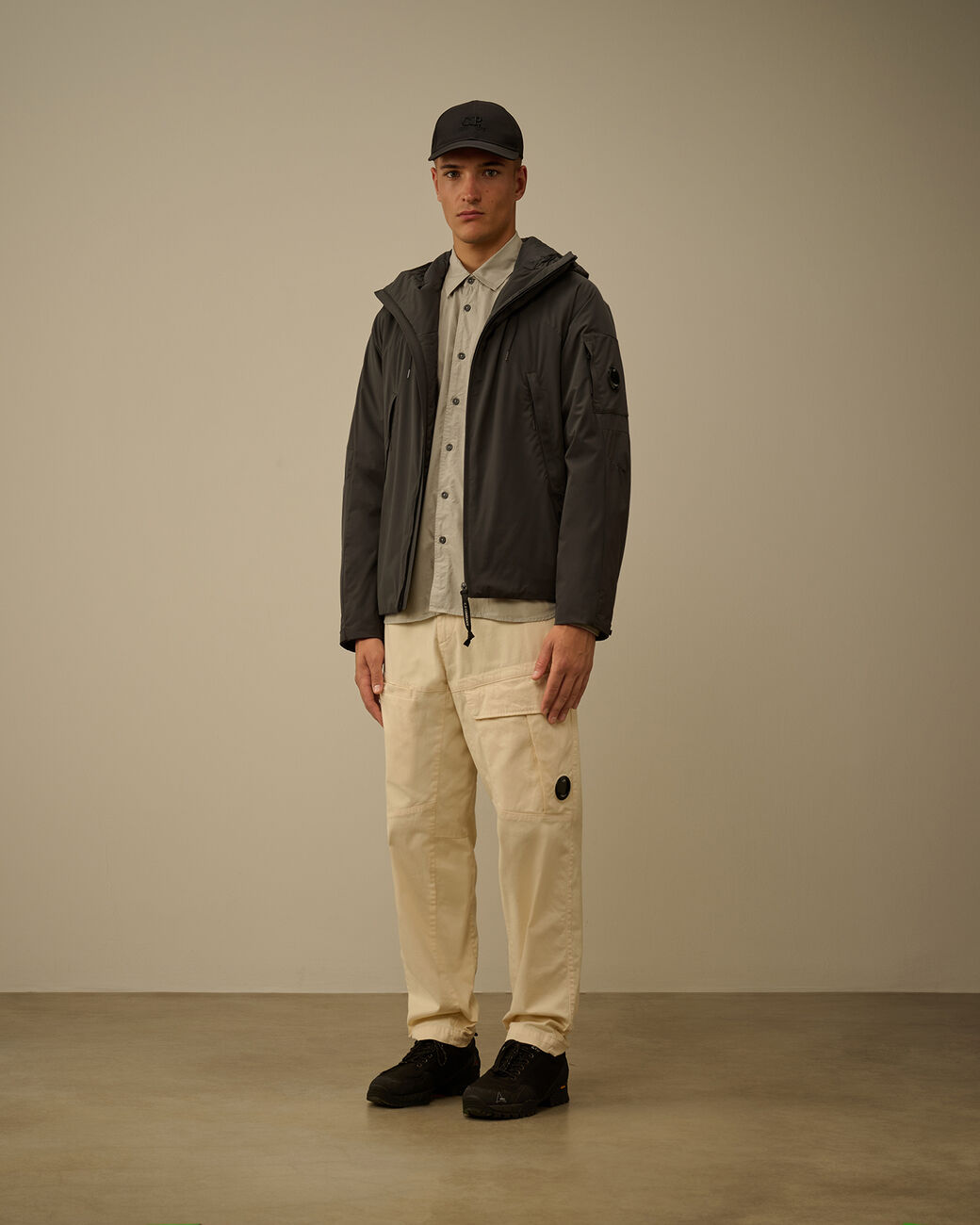 Pro-Tek Hooded Padded Jacket CP Company® AW25 - Dark Shadow