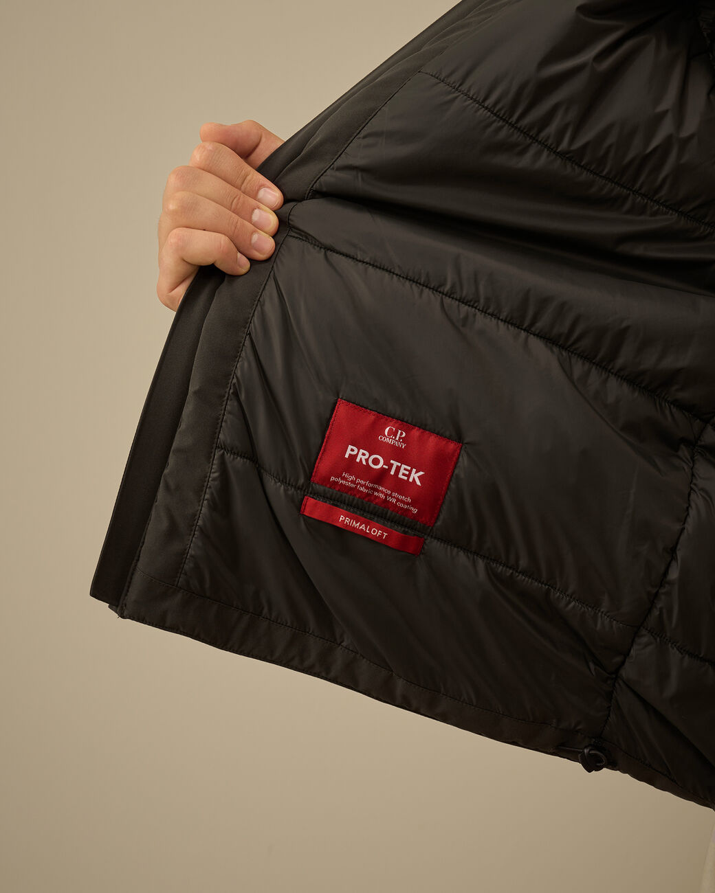 Pro-Tek Hooded Padded Jacket CP Company® AW25 - Dark Shadow