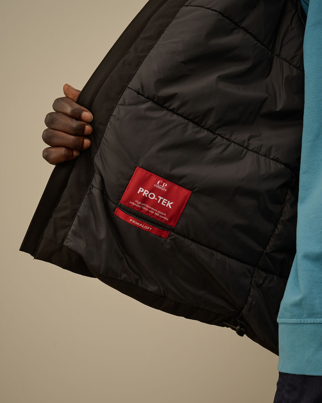 Pro-Tek Hooded Padded Jacket CP Company® AW25 - Black